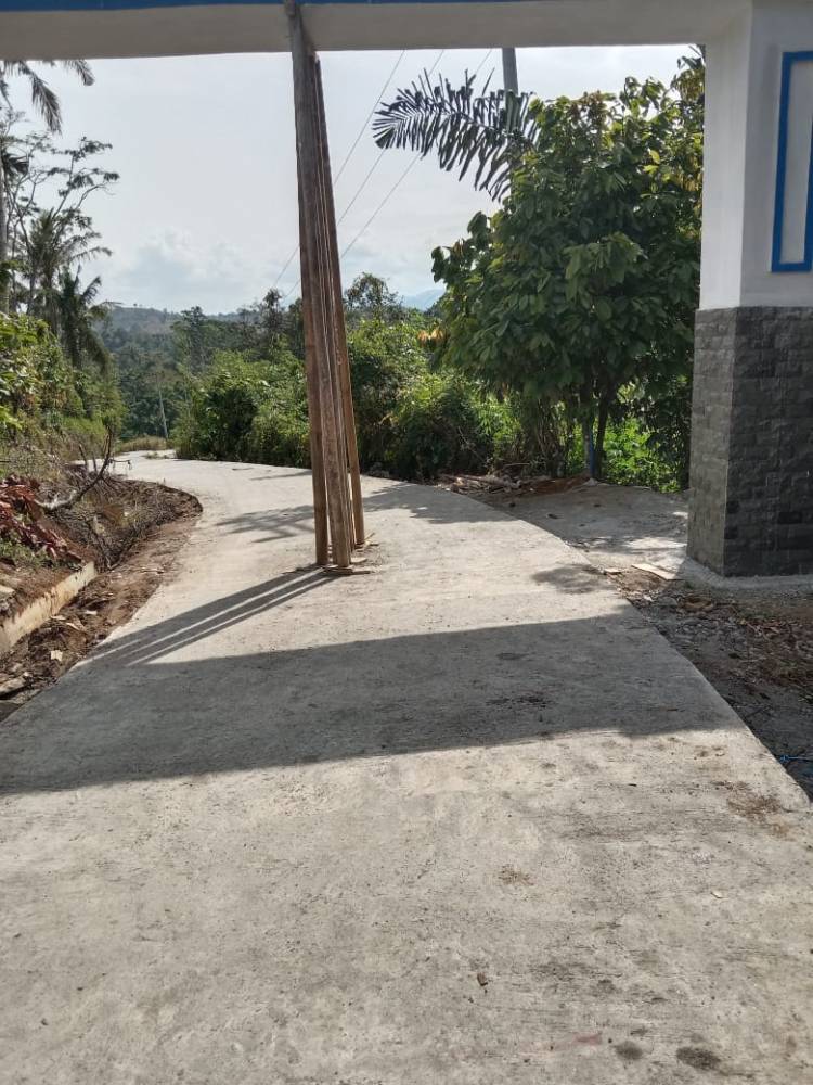 Gunakan Dana Desa, Warga Gunung Juhar Menikmati Jalan Mulus