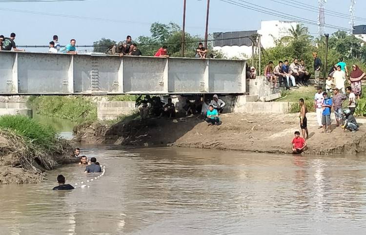 Mandi di Aliran Sungai Bedagai, Seorang Anak Tenggelam