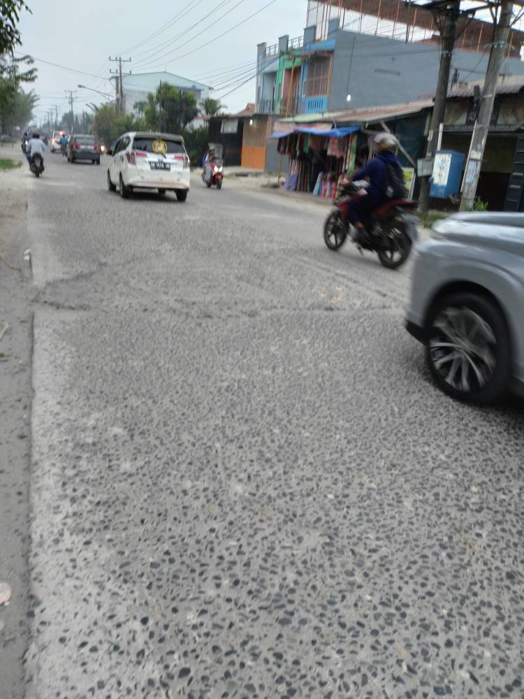 Jalan Kapten Rahmad Buddin Marelan &ldquo;Kupak-kapik&rdquo;