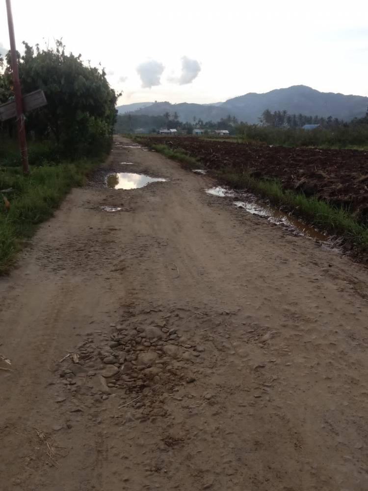 Jalan Lingkar Rumah Rakyat Tigabinanga Butuh Perbaikan