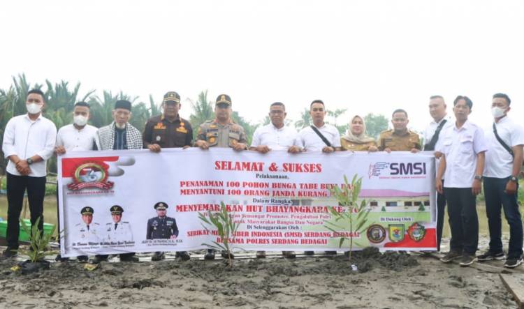 Polres dan SMSI Sergai Tanam Bibit Pohon Tabebuya di Desa Seirejo