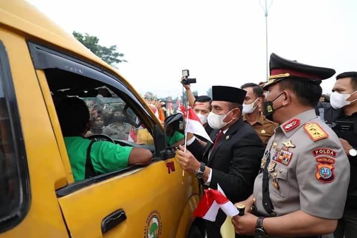 Polda Sumut Bagikan 30.000 Bendera Merah Putih dan Stiker Meriahkan HUT ke-77 Kemerdekaan RI