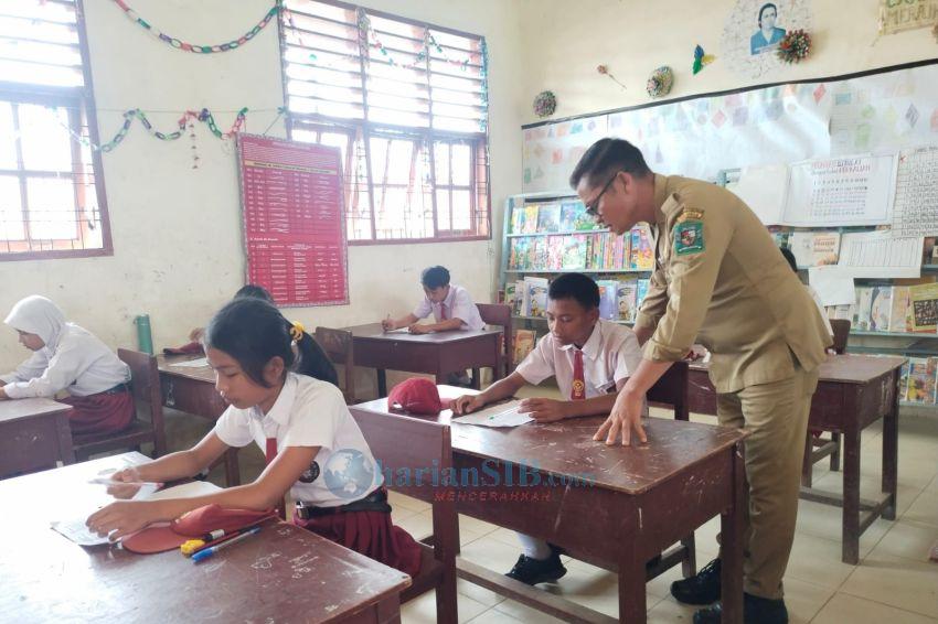 Ujian Sekolah di SD Negeri Percontohan 091317 Pamatang Raya Lancar