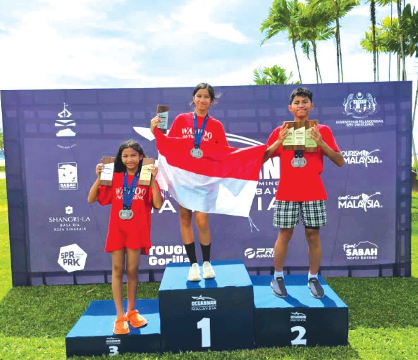 Tiga Anak Ps Gideon Munthe Juara di Turnamen Dunia Oceanman Malaysia 2024