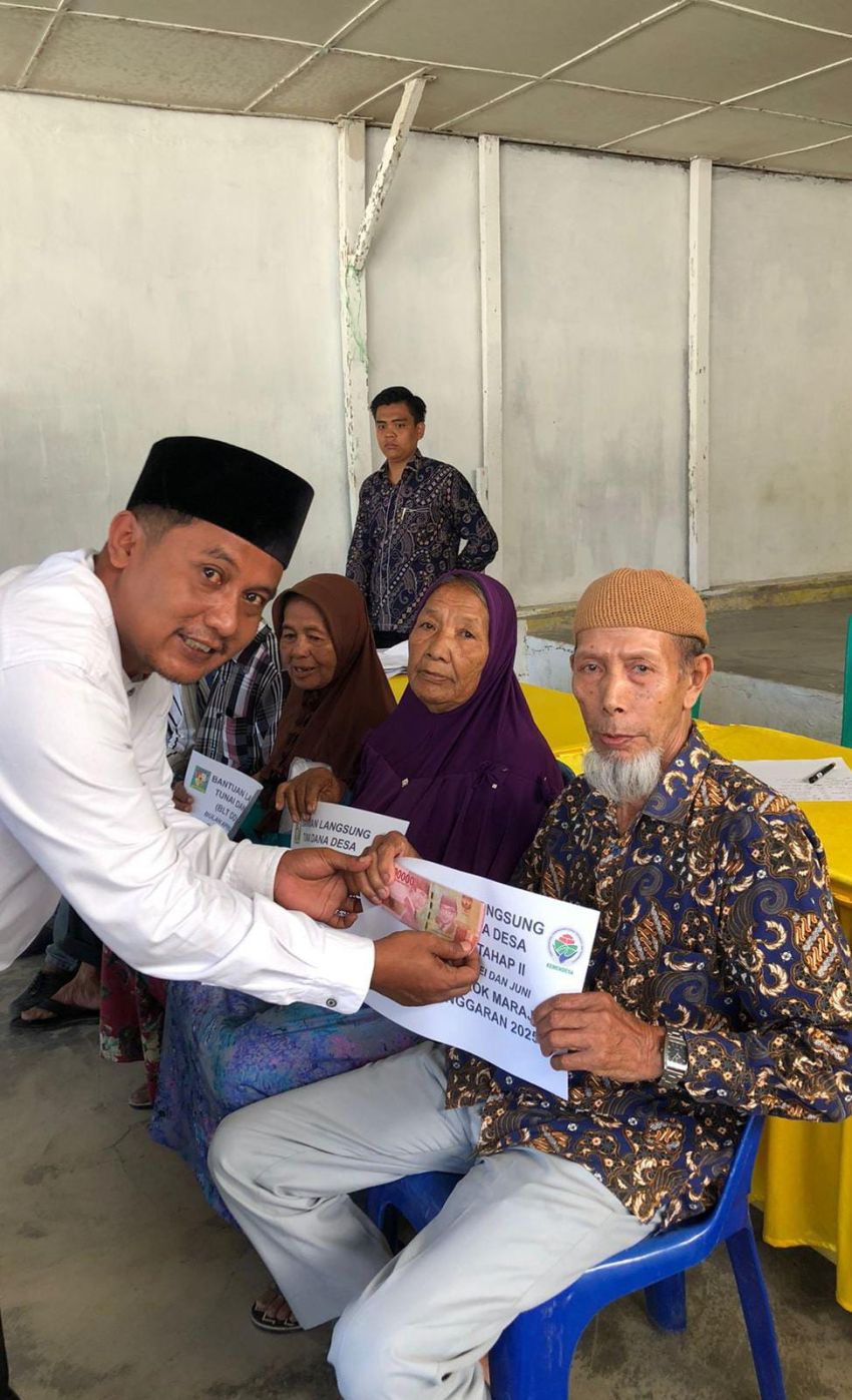 Pemerintah Nagori Dolok Maraja Salurkan BLT Dana Desa kepada 45 KPM