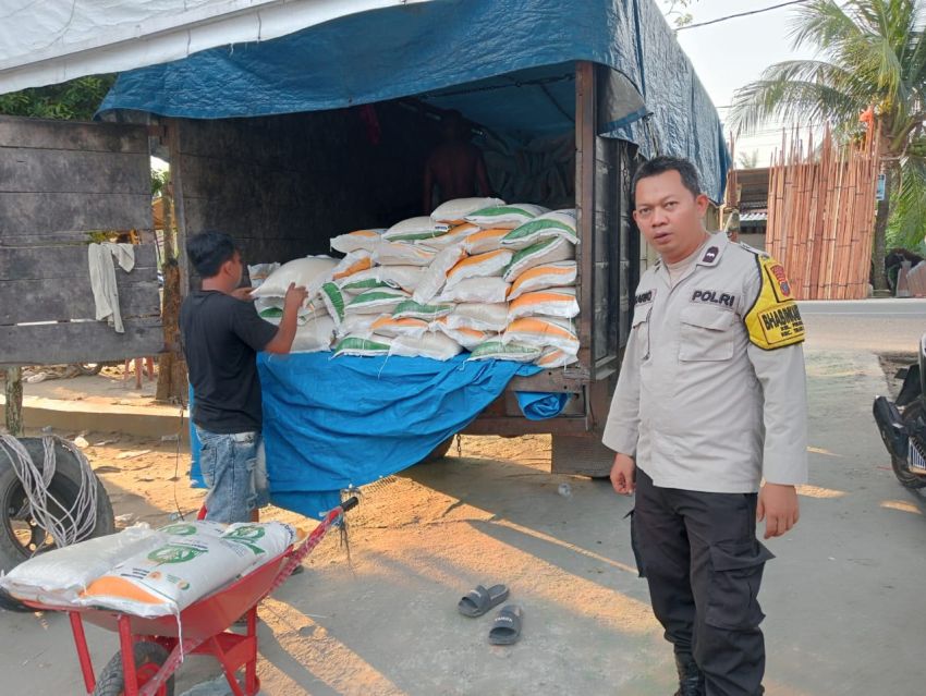 Polsek Teluk Nibung Amankan Penyaluran Bantuan Pangan Beras