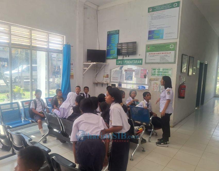 Diduga Keracunan Program Makan Bergizi Gratis, Siswa SLTP Negeri 1 Laguboti Dilarikan ke RS
