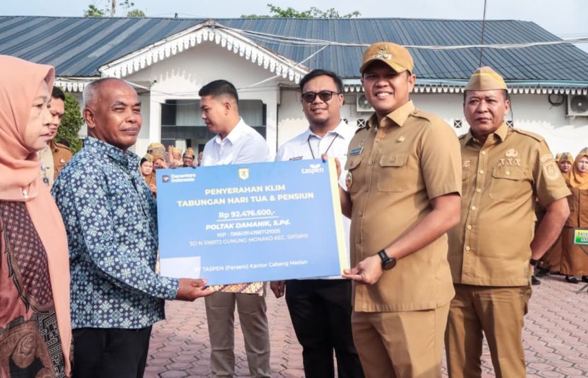 Pimpin Apel, Wabup Sergai Serahkan Dana Pensiun bagi PNS Purna Tugas