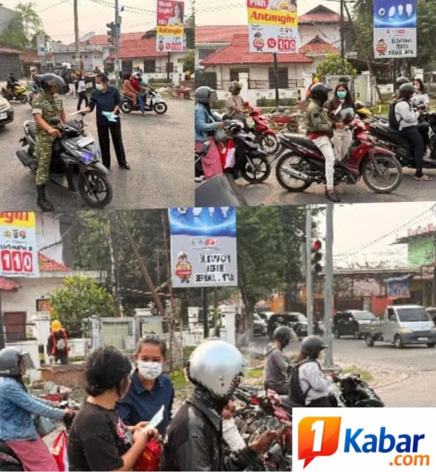 Ombudsman Sumut Bersama Dinkes Sumut Bagikan Ratusan Masker Gratis kepada Pengendara dan Pejalan Kaki di Medan